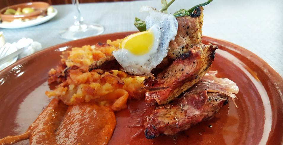 Mason la Bombonera Antequera,  Grilled Secreto Ibérico with a quail egg. A favorite all over Spain