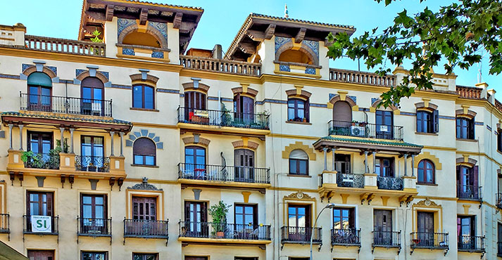 Sevilla architectural styles spanning centuries-like this tiled 
building to a 1930s-style apartment building.