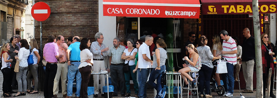 Sevilla Spain. Sunday Afternoons at the Coronado 
Families gather at this neighborhood tapa bar for drinks and a chat before Sunday lunch.